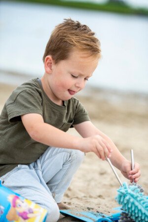 kinderfotografie buitenfotografie strand spelen